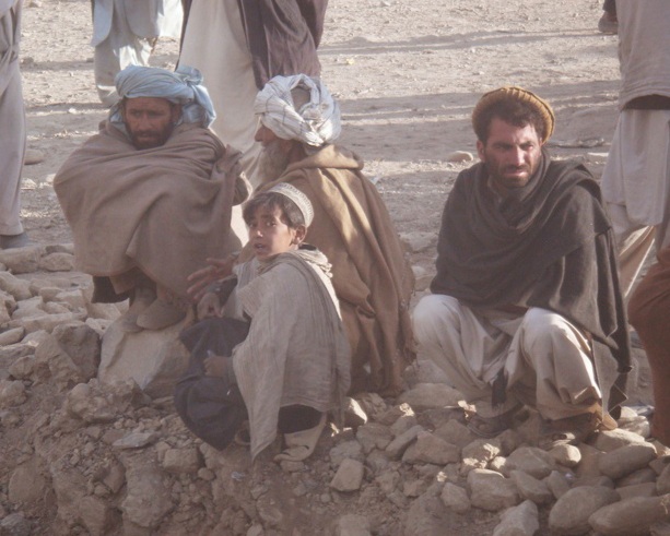 Locals watch as we roll by