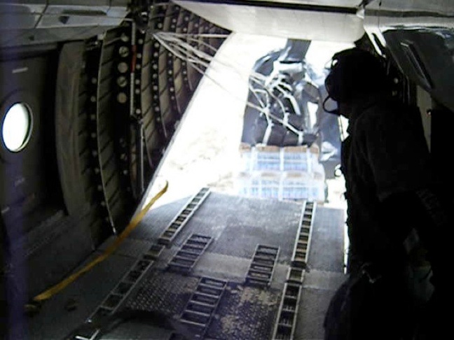 The pallets flying out the back, on their way to resupply our troops